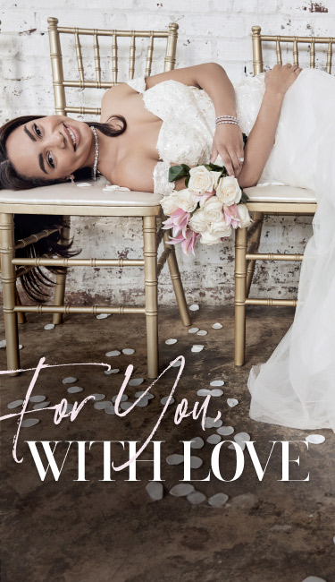 bride laying on chairs holding bouquet promoting for you, with love
